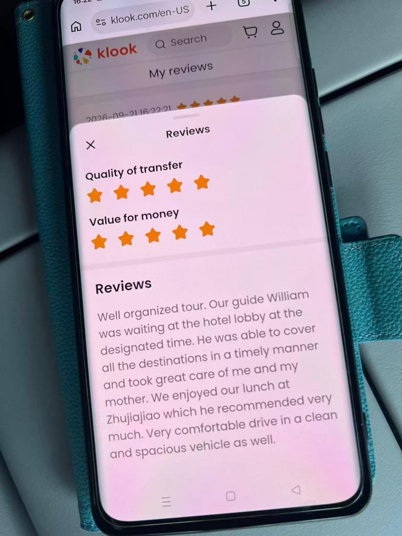 Five-star Klook review with written feedback praising guide William