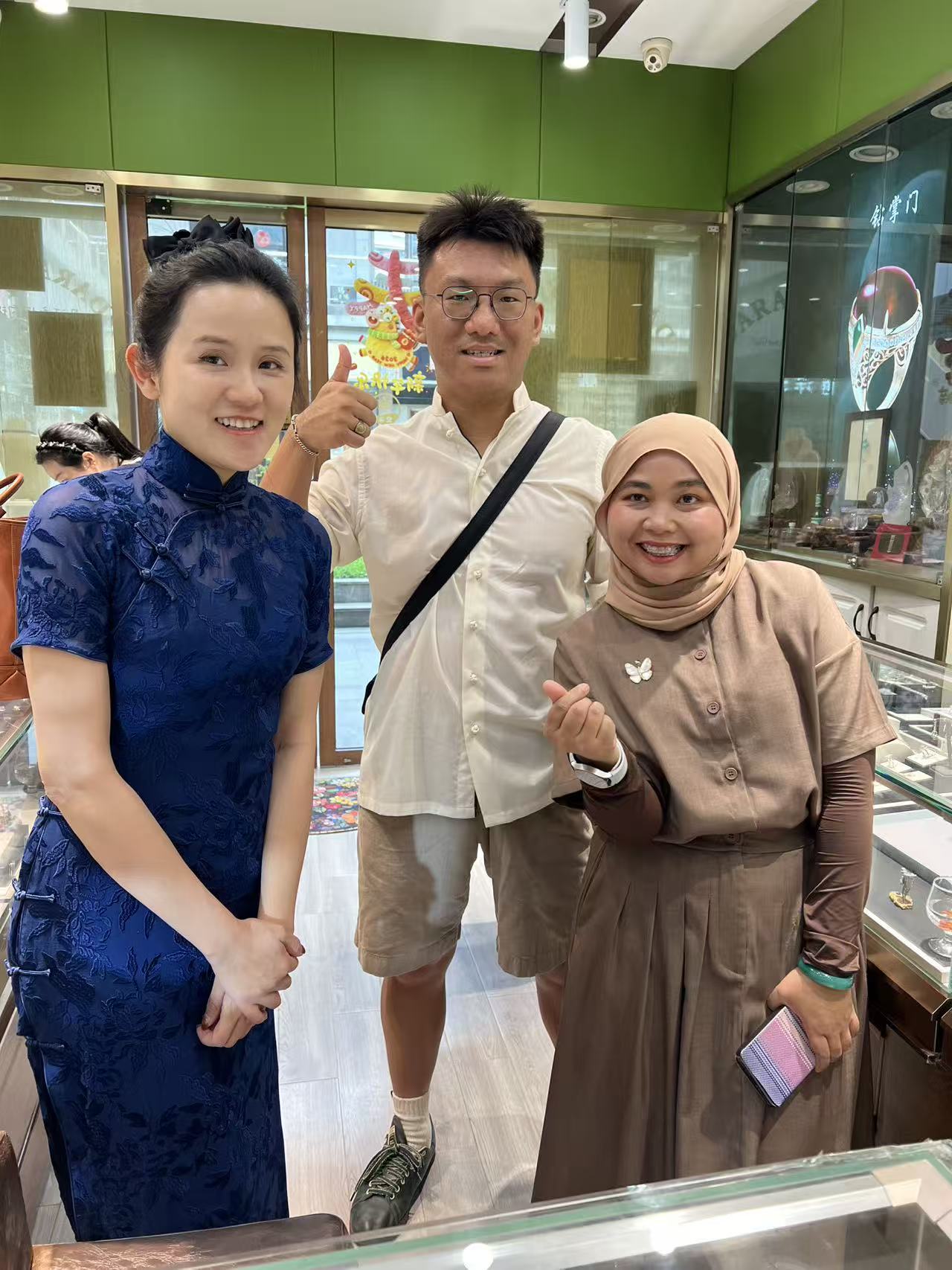 William Shan with two guests during a jewellery store visit